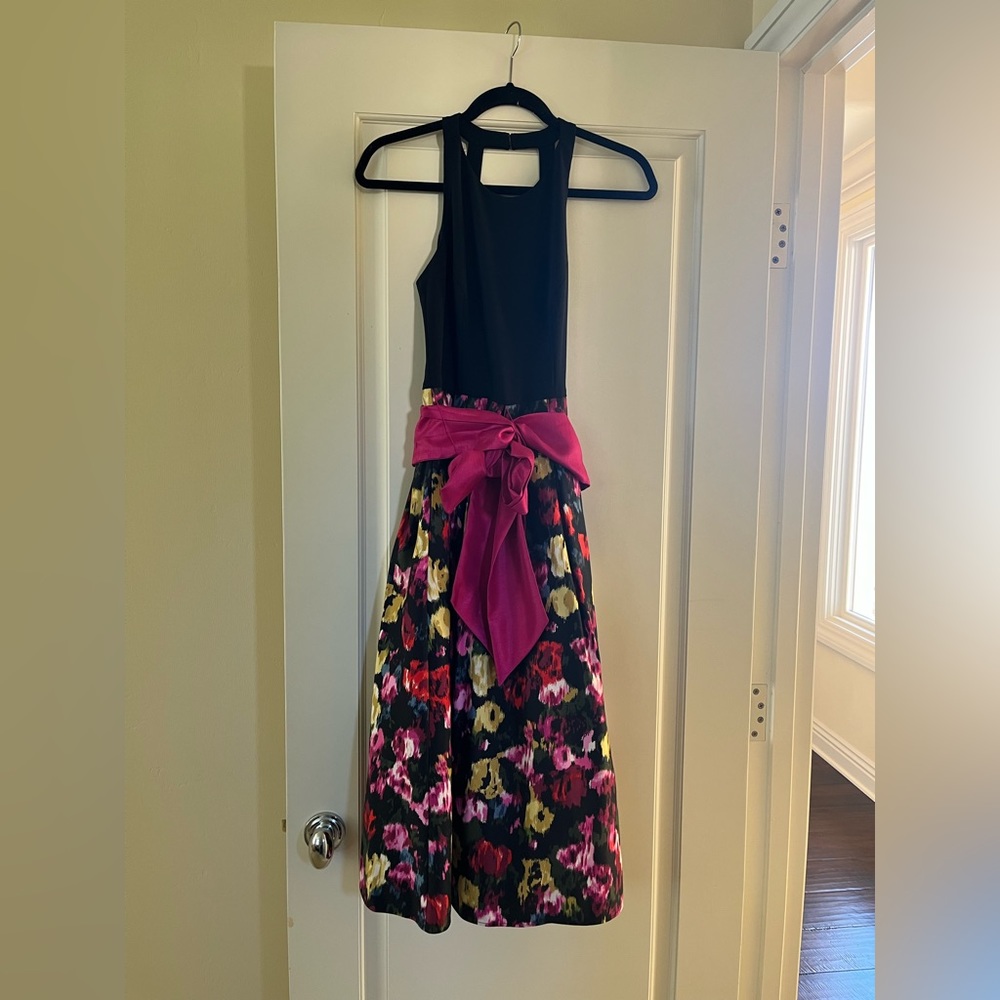 Dress makes a statement with the bright colored skirt